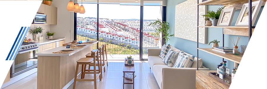 Cocina y sala moderna estilo Casas Minimalistas en desarrollo Atlas Desarrollos en Zibatá, Querétaro